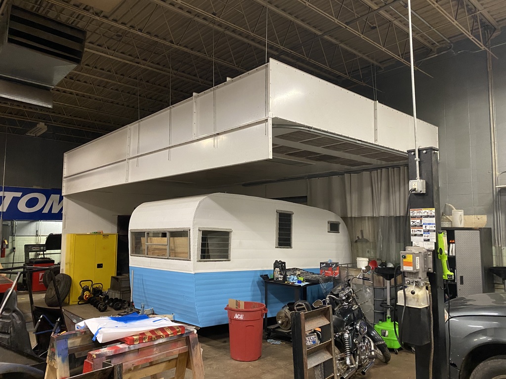 another different side view of paint booth in shop area