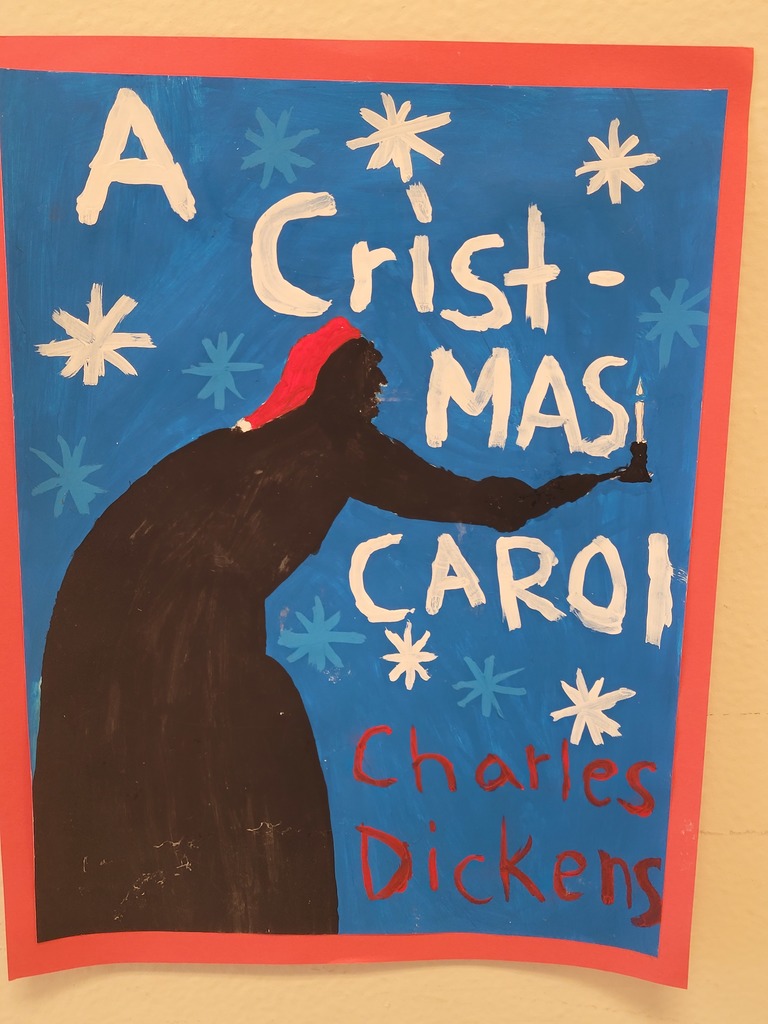 A Christmas (spelled wrong Cristmas) carol with the shaod of charles dickens